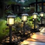 Solar garden pathway lights lining a curved stone path, casting a warm glow amidst lush greenery.