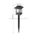 A compact black solar garden pathway light with a sleek, lantern-style design and pointed stake.