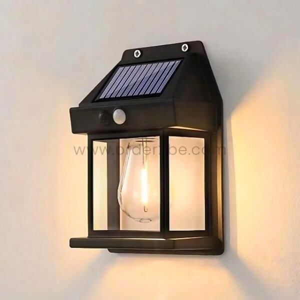 Vintage-style solar-powered wall light with a rectangular glass enclosure and warm glow.