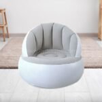 A gray inflatable chair blending into a neutral-toned room.