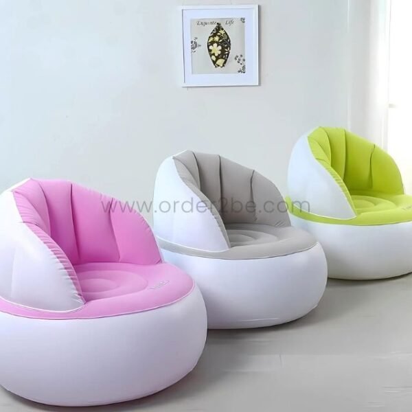 Pink, gray, and green inflatable lounge chairs in a modern living space.