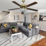 Prosonic Classic 52" ceiling fan installed in a modern living room setting.