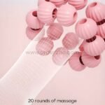 Close-up view of the pink leg massager’s rollers as they glide smoothly over a person’s arm, showcasing its 20 rounds of massage.