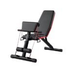 An adjustable full-body workout bench with a sleek black and red design, featuring integrated resistance bands.