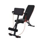 A sleek black and red adjustable full-body workout bench with integrated resistance bands, set against a clean white background.