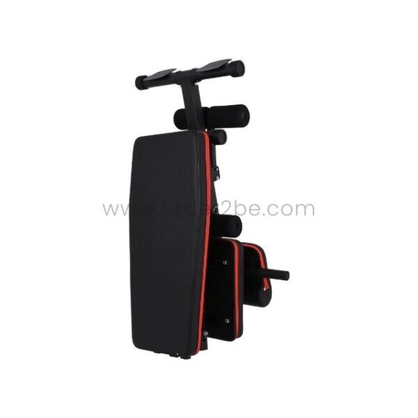 An adjustable full-body workout bench in its vertical storage position, emphasizing its space-efficient design.