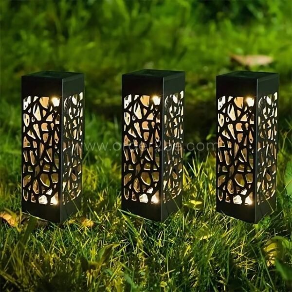 Close-up of creative solar garden lights featuring elegant, patterned designs that catch the eye.