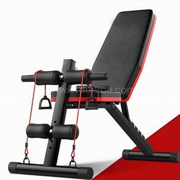 A sleek black and red multi-functional home gym bench with adjustable settings and integrated resistance bands.