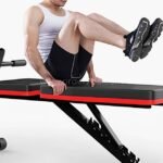 A man performing core exercises on a flat multi-functional home gym bench, showcasing its versatility.