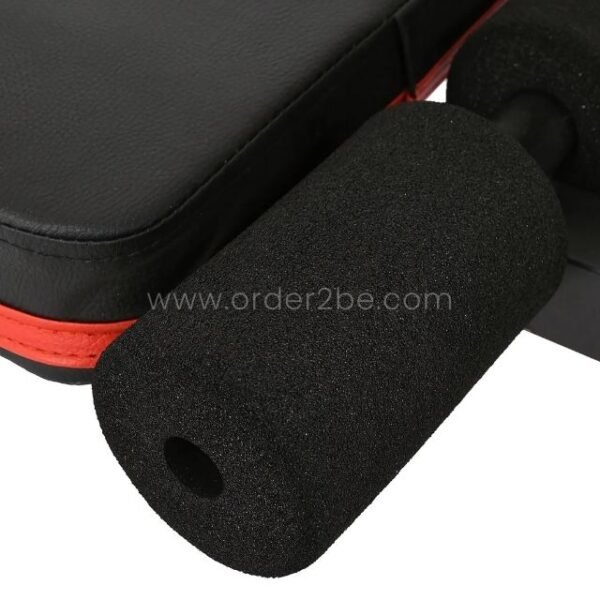 A close-up of the black armrest padding on an adjustable full-body workout bench, showcasing its soft and supportive design.