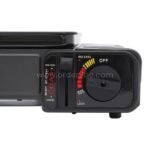 Close-up of the grill's control dial with blue flames visible underneath.