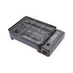 Sleek side angle of the portable grill showing its compact dimensions and ventilation ports.