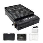 Compact grill stove with all its accessories laid out - carrying case, grilling grate, tongs and cleaning brush ready for adventure.