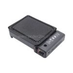 Portable grill with protective lid securely closed for transport or storage.