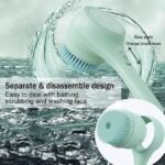 Rechargeable rotating shower brush demonstrating its easy-to-change head design, shown against a watery background.