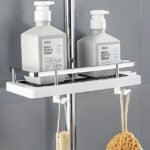 Space-saving shower caddy mounted on a rod, storing bottles and accessories like a loofah and sponge.