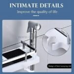 Close-up of space-saving shower caddy showing built-in slot for hand spray nozzle.