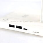 USB ports and wireless charging coil detail on a modern dimmable desk lamp.