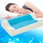 A woman snoozes in tranquil bliss on the Restform Cool Gel Pillow, highlighting its sleek gel top and cushy memory foam support.