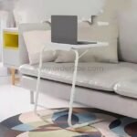 A laptop on the Table Mate Adjustable Tray beside a gray sofa—home office reimagined.