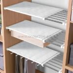 Empty Adjustable Shelf Organizer installed in a bedroom closet, showing its compact, flexible design.