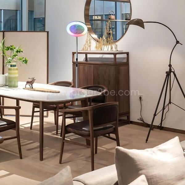 Flexible fan floor light adding color and breeze to a modern dining space.