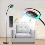 A flexible fan floor light glowing with RGB and cooling a modern living room.