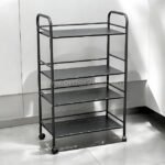 Portable multi-shelf storage rack with perforated shelves positioned in a brightly lit room.