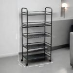 Portable multi-shelf storage rack (125cm tall, 60cm wide) with wheels and perforated black shelves in a modern minimalist room.