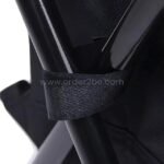 Close-up of the black portable backpack chair frame showing its durable design.