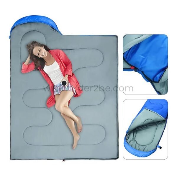 A woman resting comfortably in a blue portable sleeping bag with light gray interior, demonstrating its roomy and snug design.