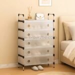 Transparent multi-tier shoe cabinet with five drawers beside a bed in a cozy bedroom.