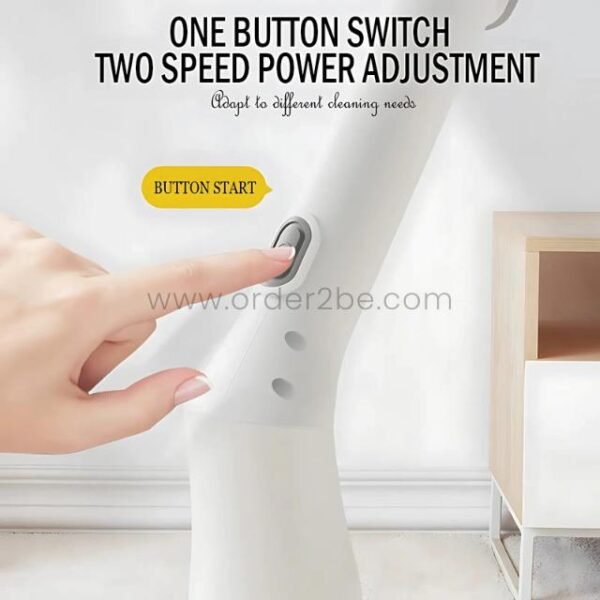 Hand pressing button on 6-in-1 electric spin scrubber handle to switch between two cleaning speeds.