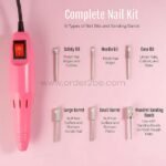 Pink electric nail drill with six metal bits and sanding bands labeled: safety, needle, cone, large barrel, small barrel, and mandrel.