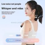 Woman using ergonomic handheld massage gun on her neck, highlighting low-noise operation.