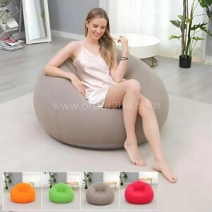 Inflatable bean bag chair in gray, shown in a bright modern living room with multiple color options displayed, lightweight and easy to inflate.