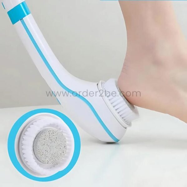 Close-up of foot pressed against rotating exfoliation brush head with textured surface.