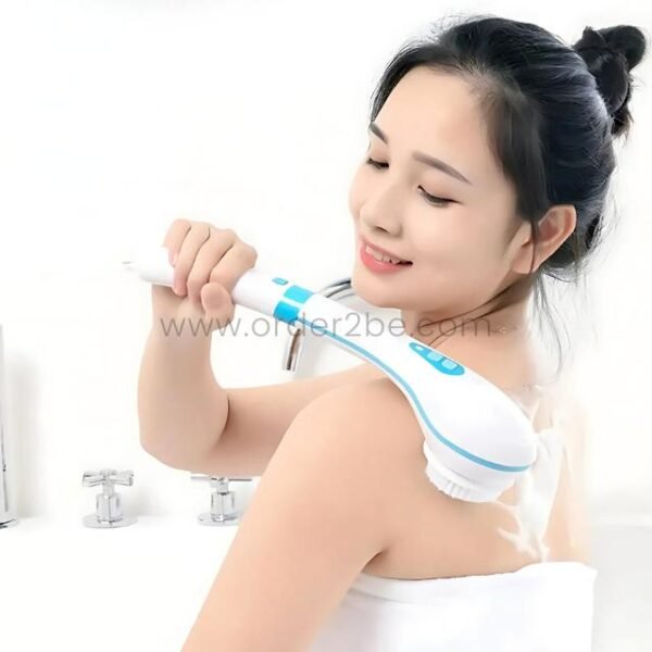 Woman reaching her back with an electric bath brush in a modern bathroom.